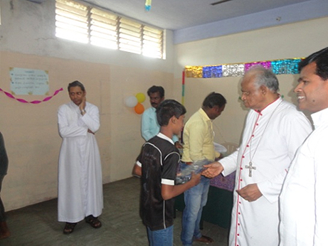 DISTRIBUTION OF NEW DRESS TO STREET CHILDREN