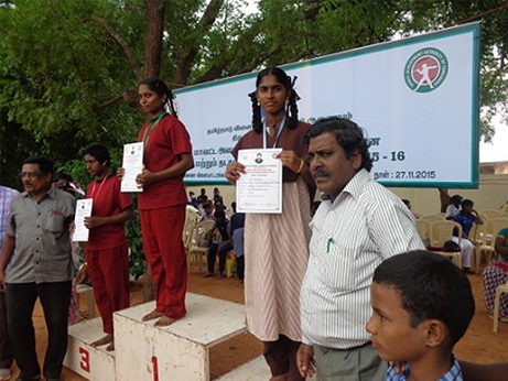 RECEIVING AWARDS AT DISTRICT SPORTS DAY ABLED STUDENTS